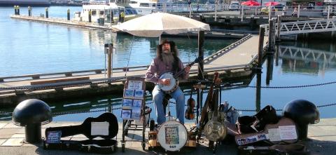 Renowned Victoria busker Dave Harris, a Causeway regular 